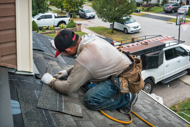 Professional Roofing technician working in West Finley, PA